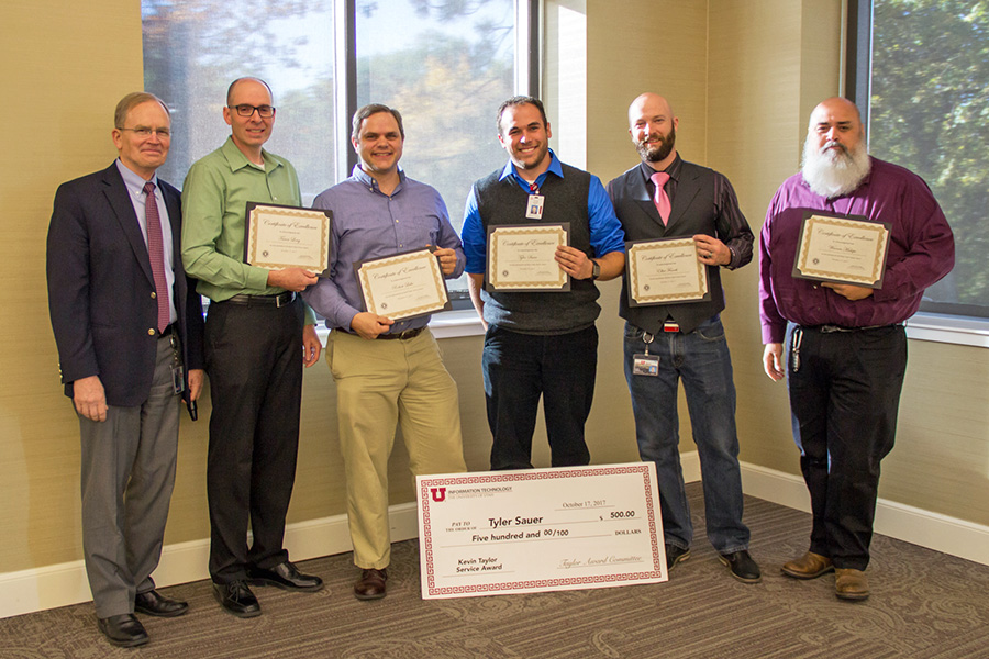 From left: CIO Steve Hess and 2017-18 Kevin Taylor Service Award nominees Trevor Long, Rob Lake,  Tyler Sauer (this year's winner), Elliot Fenech, and Warren Malupo.