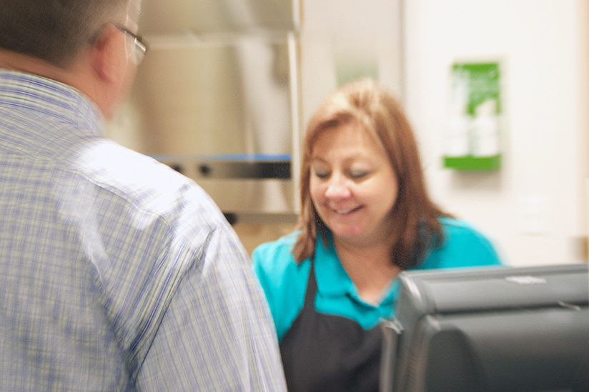 102 Tower Cafe manager Patty McKean serves a customer on Thursday, February 18, 2017.