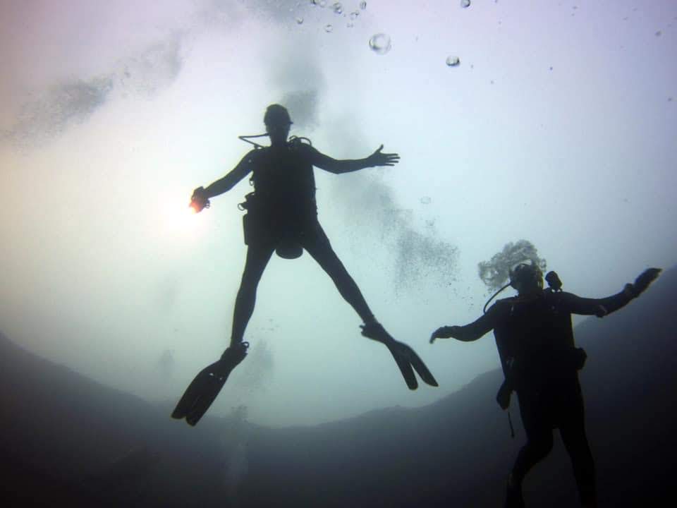 CISO Corey Roach, left, goes for a dive. (Photo courtesy of Corey Roach)