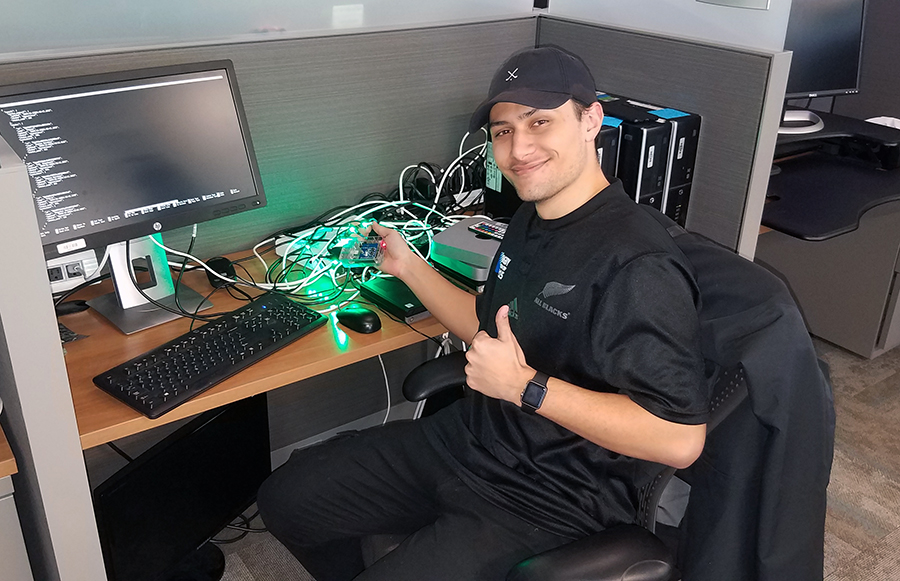 Student employee Maiko Tuitupou works on a Raspberry Pi LED monitoring project.