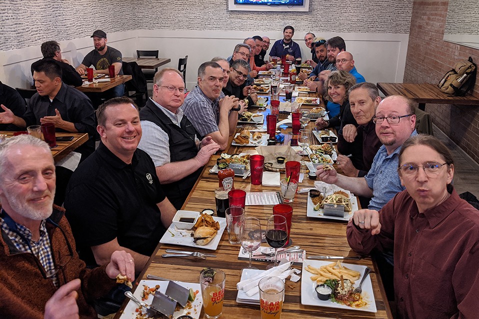 Westnet attendees share dinner during the January 2020 meeting. (Courtesy of Westnet)