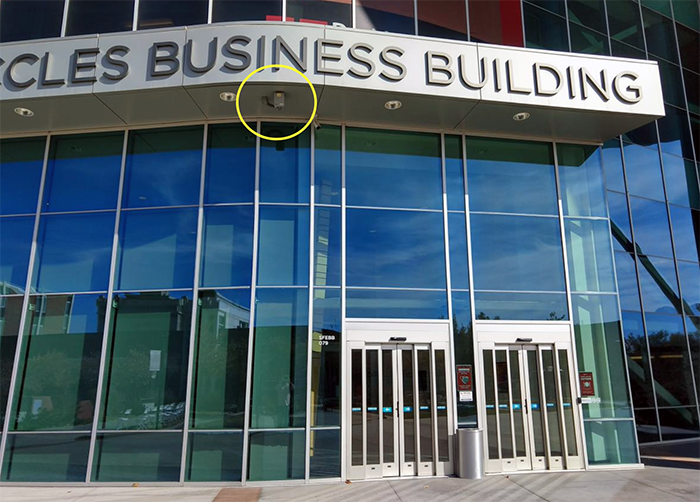 A wireless access point, highlighted here, was installed at the entrance of the Spencer Fox Eccles Business Building. Image courtesy of UIT Network Services.