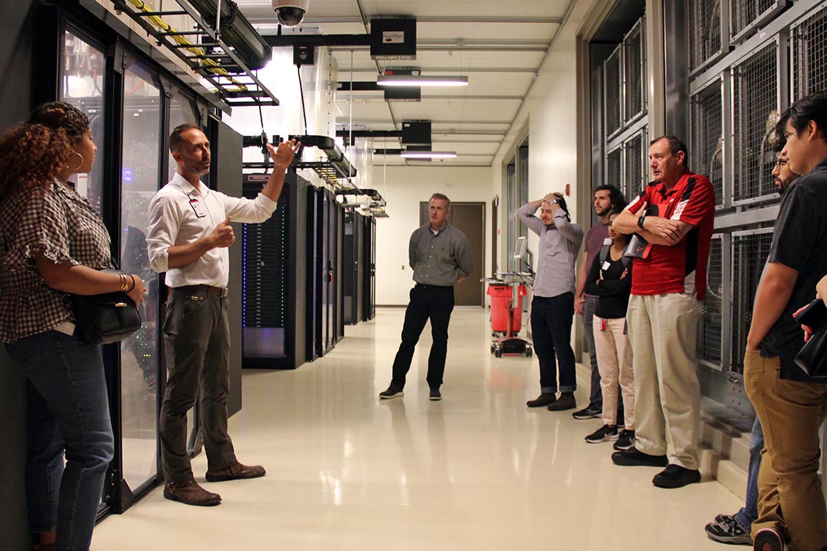    UIT student employees, student employee program sponsors, and other University Support Services staff members attended a tour of the U's Downtown Data Center August 18.