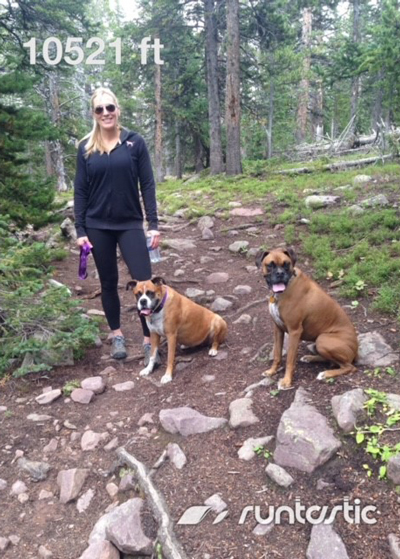Ellett hikes with her dogs, two boxers.