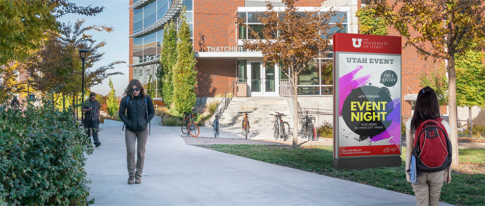 A pedestrian-focused digital sign lines a campus path. Image courtesy of the University of Utah.
