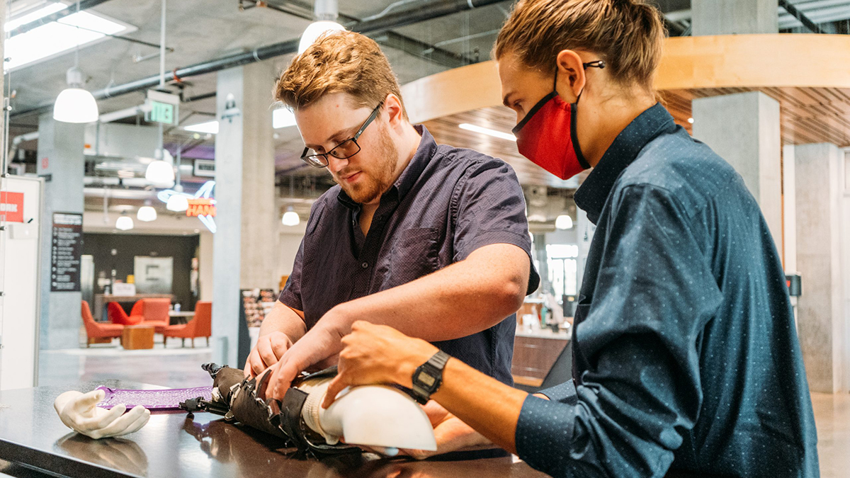 Nick Witham, pictured at left, is a former biomedical engineering Ph.D. student at the U and founder of GAIA Technologies, whose mission is to improve lives through better prosthetics.
