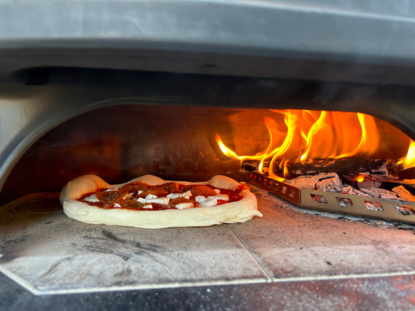 Harris enjoys cooking pizza in his outdoor oven.