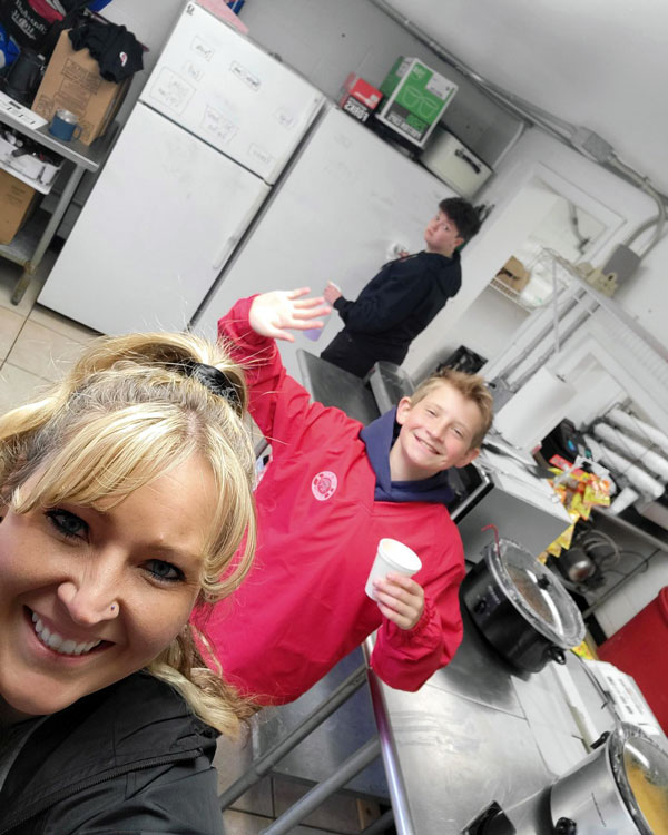 Winters (front left), her son Jaxon (center), and stepdaughter Kylaa inside the Riverside Snack Shack. (Photo courtesy of Heather Birky Winters)