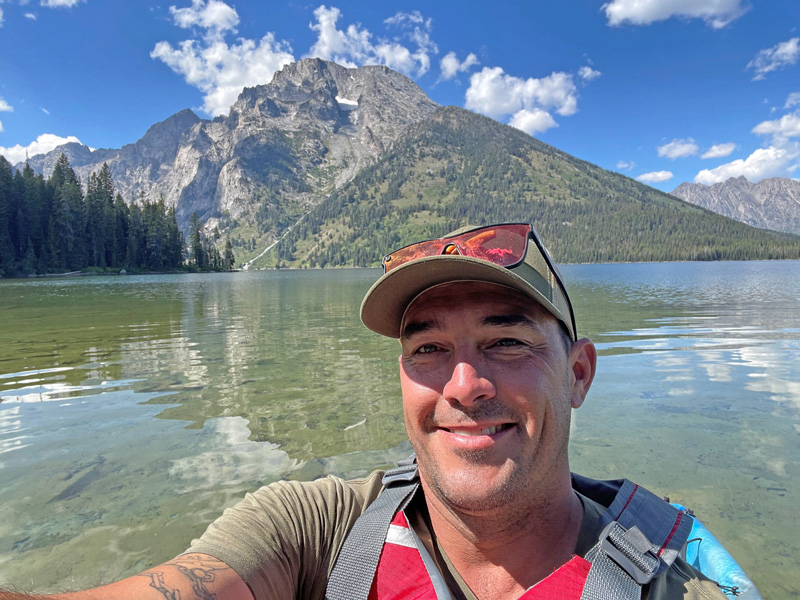 Puzey kayaks on Leigh Lake in Grand Teton National Park. (Courtesy of Brett Puzey)