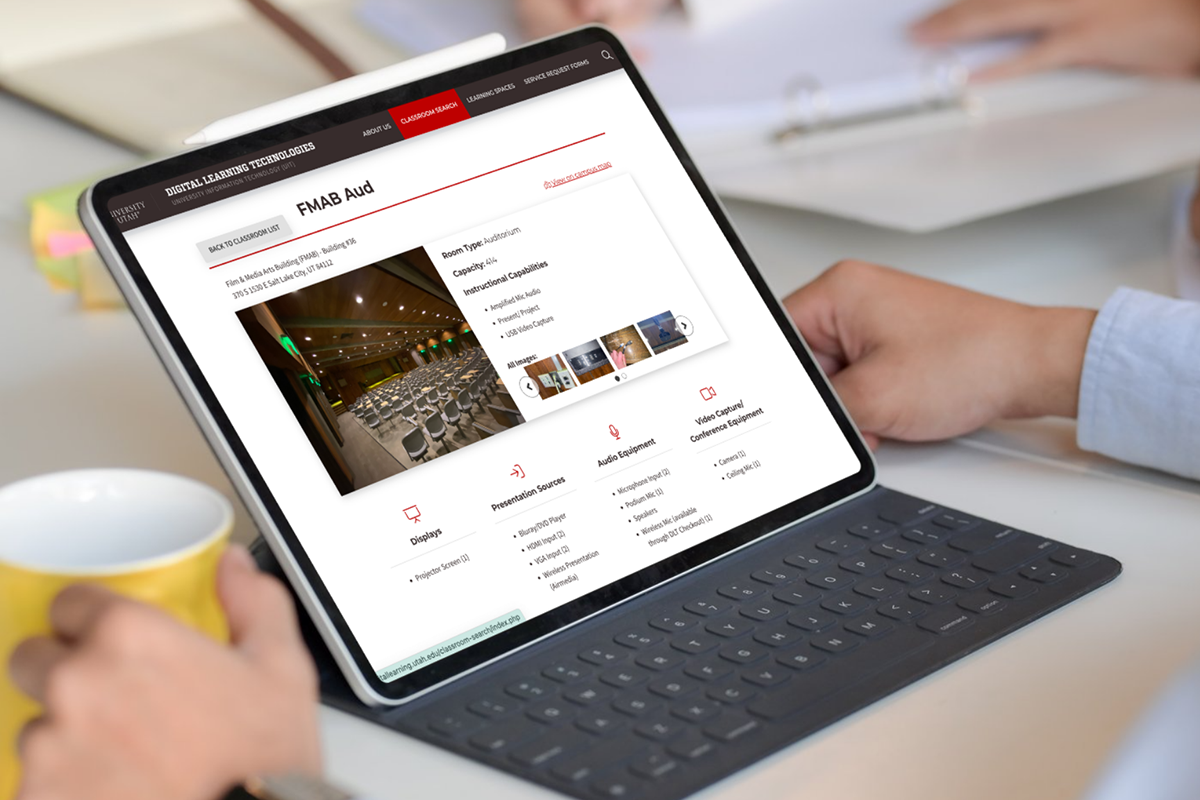 The photo illustration above shows a tablet computer displaying classroom search results with information about Film & Media Arts Building Room 36, e.g., room type (auditorium), capacity (414), and instructional capabilities (amplified mic audio, present/project, and USB video capture).