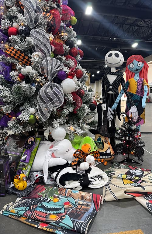 “The Nightmare Before Christmas”-themed tree featured ribbons, ornaments, board games, books, collectible items, character plushies, and more. (Courtesy of Emily Jacoby)