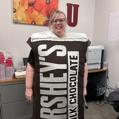 USS Administrative Manager Tammy Mabey dressed as a Hershey's Milk Chocolate bar.