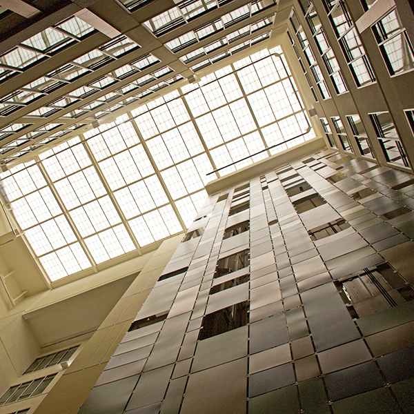 A view from the atrium looking up at the surrounding offices.