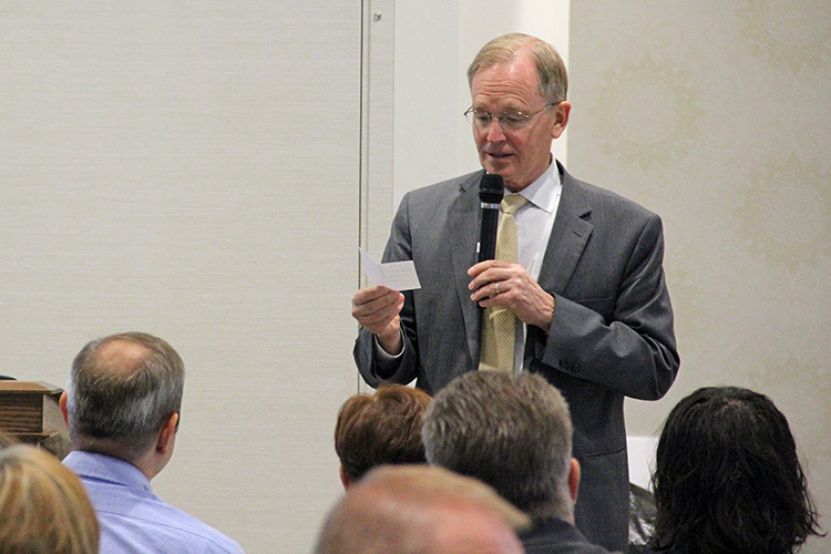 CIO Steve Hess answers a question submitted by a UIT employee during a Q&A session at the September 17 All-Hands Meeting at the Alumni House.