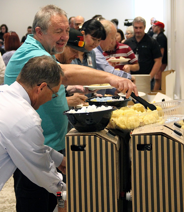 UIT employees grab food before the All-Hands Meeting on September 17 at the Alumni House.