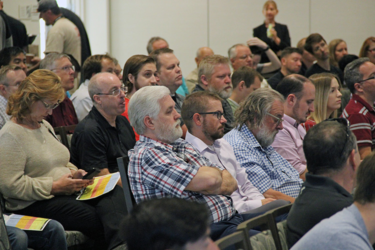 UIT employees listen to CIO Steve Hess' presentation during the All-Hands Meeting on September 17 at the Alumni House.