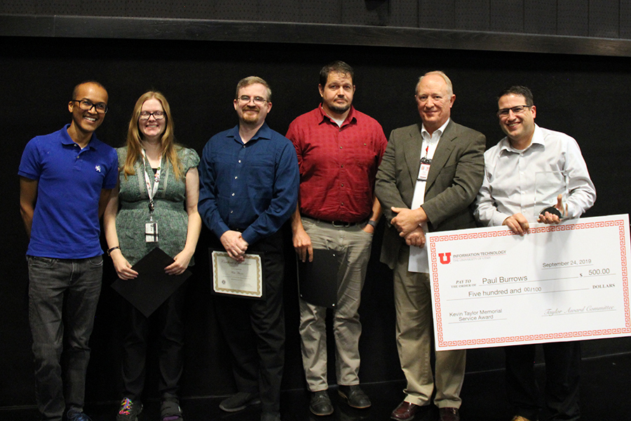 Nominees for the 2019 Kevin Taylor Memorial Service Award, L-R: Monte Shaw, Beth Sallay, Matt Munro, and Jake Johansen. Also pictured: Bryan Morris, chair of the award committee, and Jon Thomas, Teaching & Learning Technologies director, who accepted on behalf of this year's winner Paul Burrows. Not pictured are Burrows and Jody Sluder, another nominee, who were unable to attend this year's ceremony.