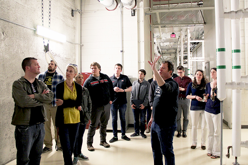 CHPC Director Tom Cheatham explains how the various systems work at the Downtown Data Center during a tour on April 5, 2019.