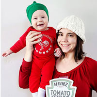 Kelsey Loizos, dressed a ketchup packet, takes a photo with her son, who's dressed as sriracha.