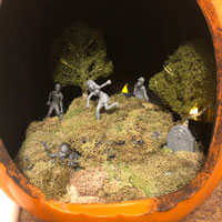 Shenia Sellers wrote, "My Zombie graveyard pumpkin diorama 🧟‍♀️"