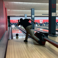 Ken Pink releases his bowling ball on the lane.