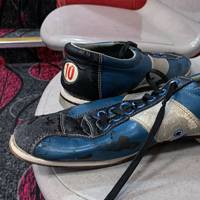 A set of bowling shoes on a chair at the A. Ray Olpin Union bowling alley