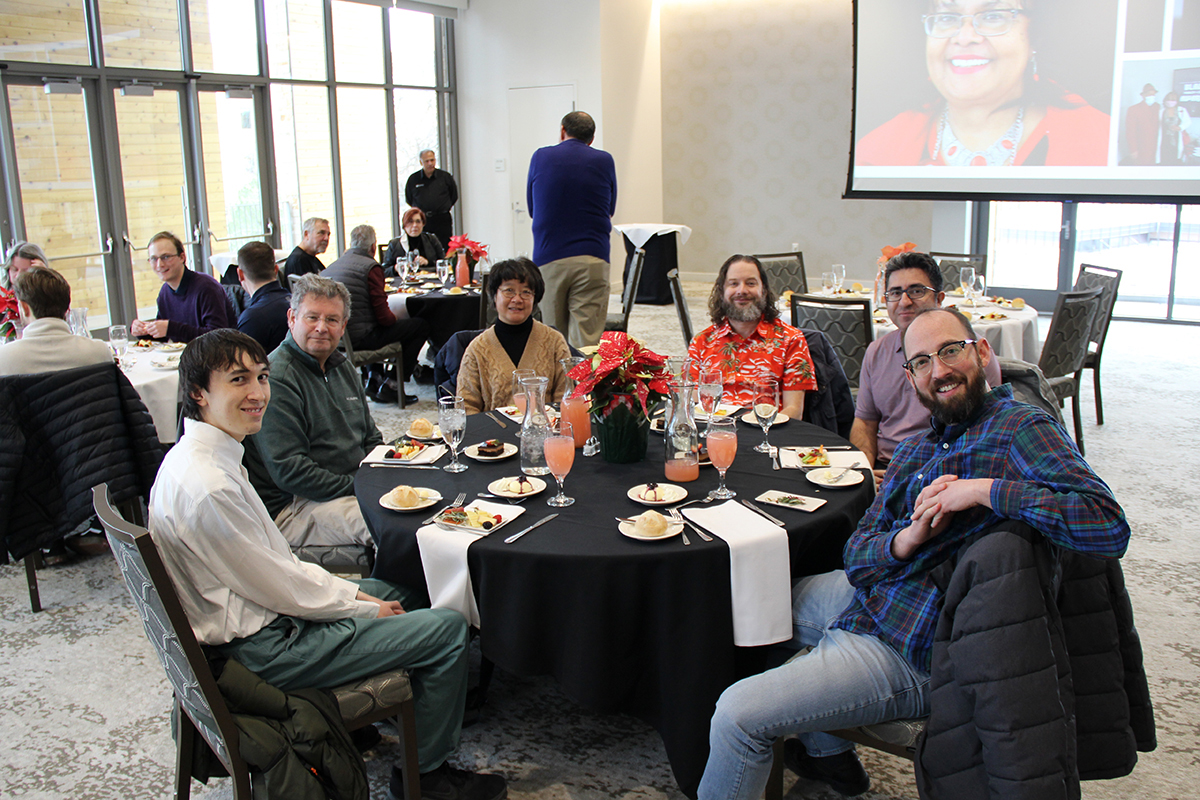 UIT employees gather at the 2022 UIT Holiday Luncheon at the Alumni House.