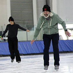 UIT employees ice skate during the UIT Holiday Luncheon on December 11, 2023, at the Utah Olympic Oval. (Photo courtesy of Craig Bennion)