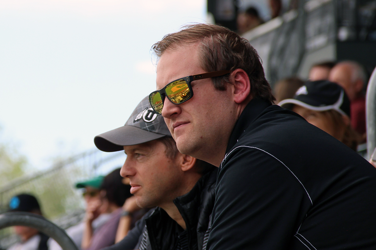 L-R: Phil Kimball and Dax Christensen watch the May 22 minor league baseball game between the Salt Lake Bees and Albuquerque Isotopes.