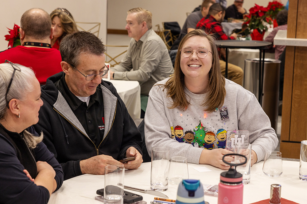 L-R: Shellie Eide, Roger Kowallis, and Abbey Allen at the 2024 UIT Holiday Party and Prize Giveaway on December 16 at the Suite Lounge of the Ken Garff University Club.