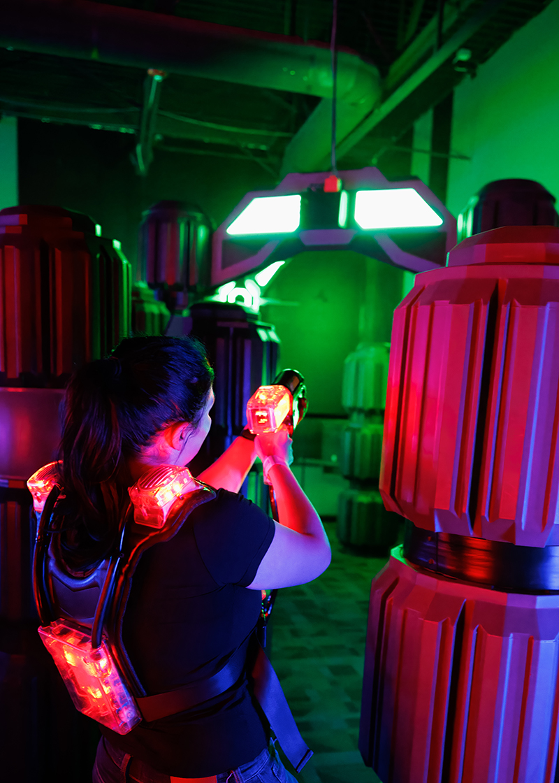 Aspen Field, systems administrator for UIT's UMail & Collaboration team, enjoys a round of laser tag. (Courtesy of Thanh Nguyen)