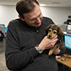 UberPuppies visits USS on National Puppy Day