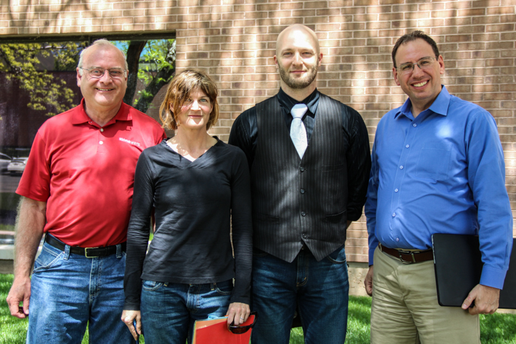 Three newest members of the IT Professionals Board of Directors — Mike Basinger, from left, Holly Christmas, and Elliot Fenech — with Board President Doug Ressler, right. 