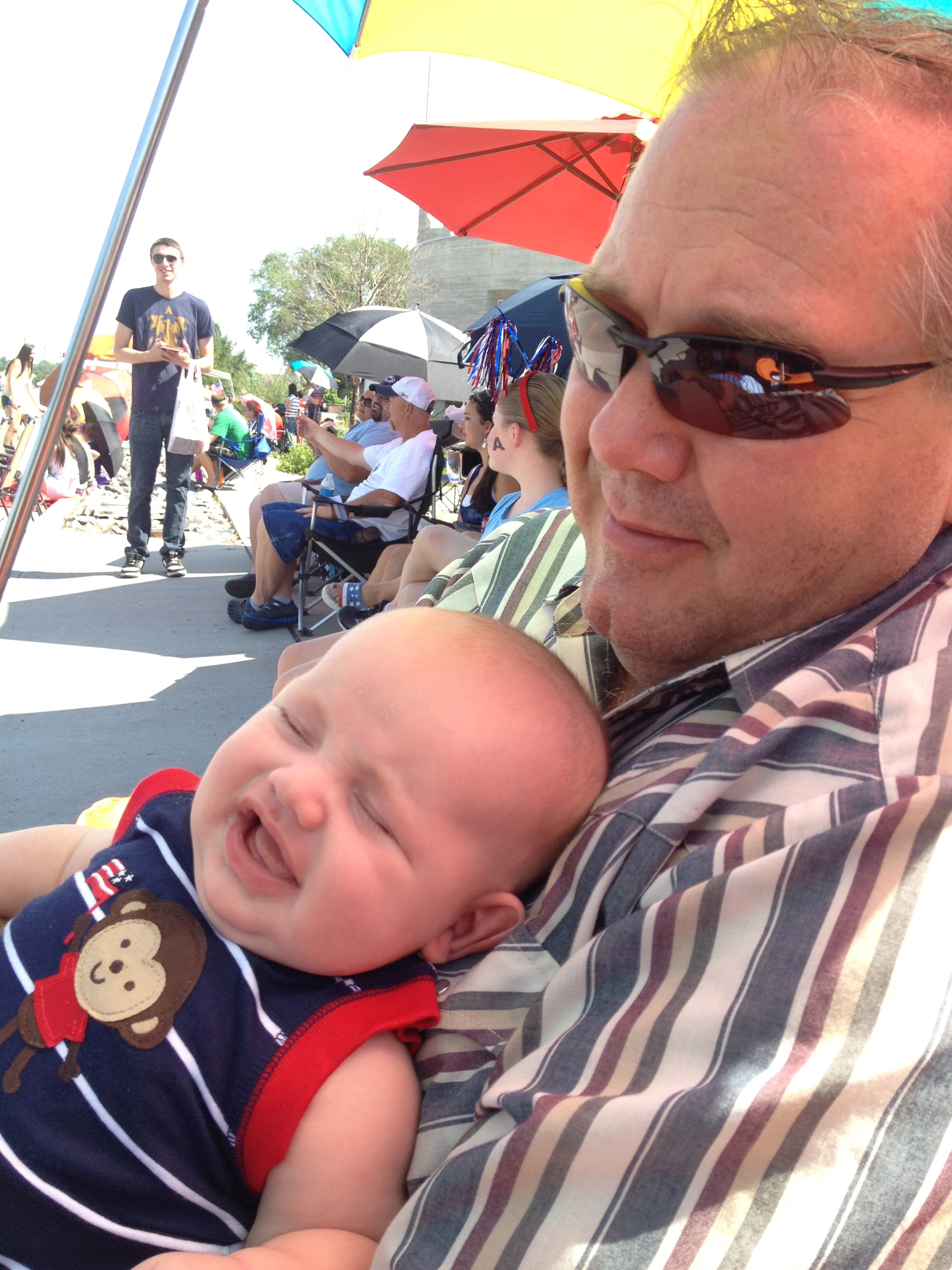 Marv Hawkins lounges with his grandson, Ben.